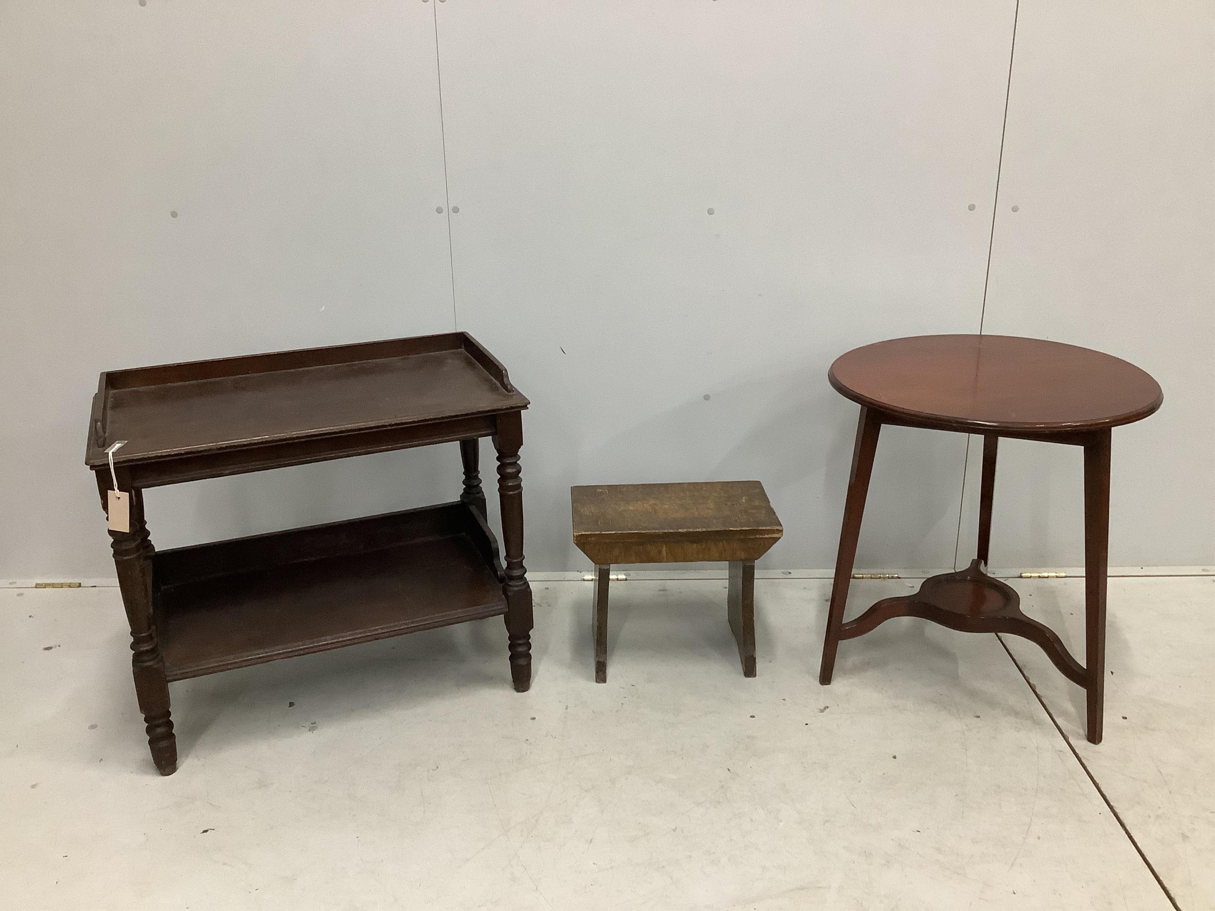 A 19th century pine stool with simulated painted grain together with an Edwardian two tier circular occasional table and one other two tier table. Condition - poor to fair